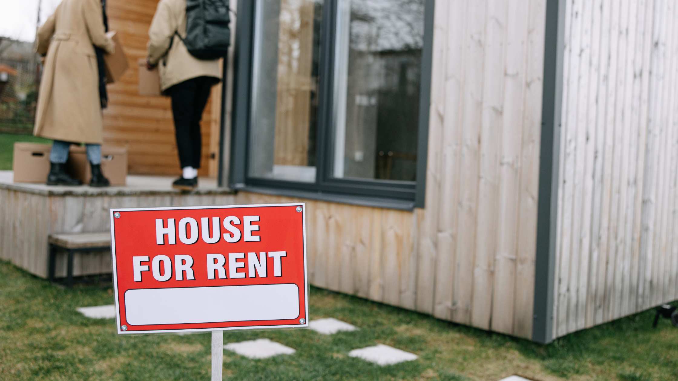 House for rent sign displayed outside a residential property, representing rental affordability pressures, tenant demand, and investment opportunities in the Australian rental market.
